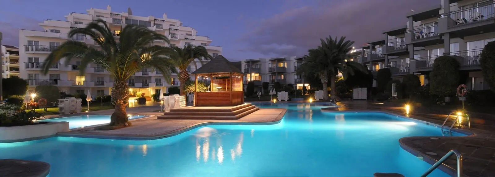 HG Tenerife Sur: A swimming pool with a wooden gazebo, palm trees