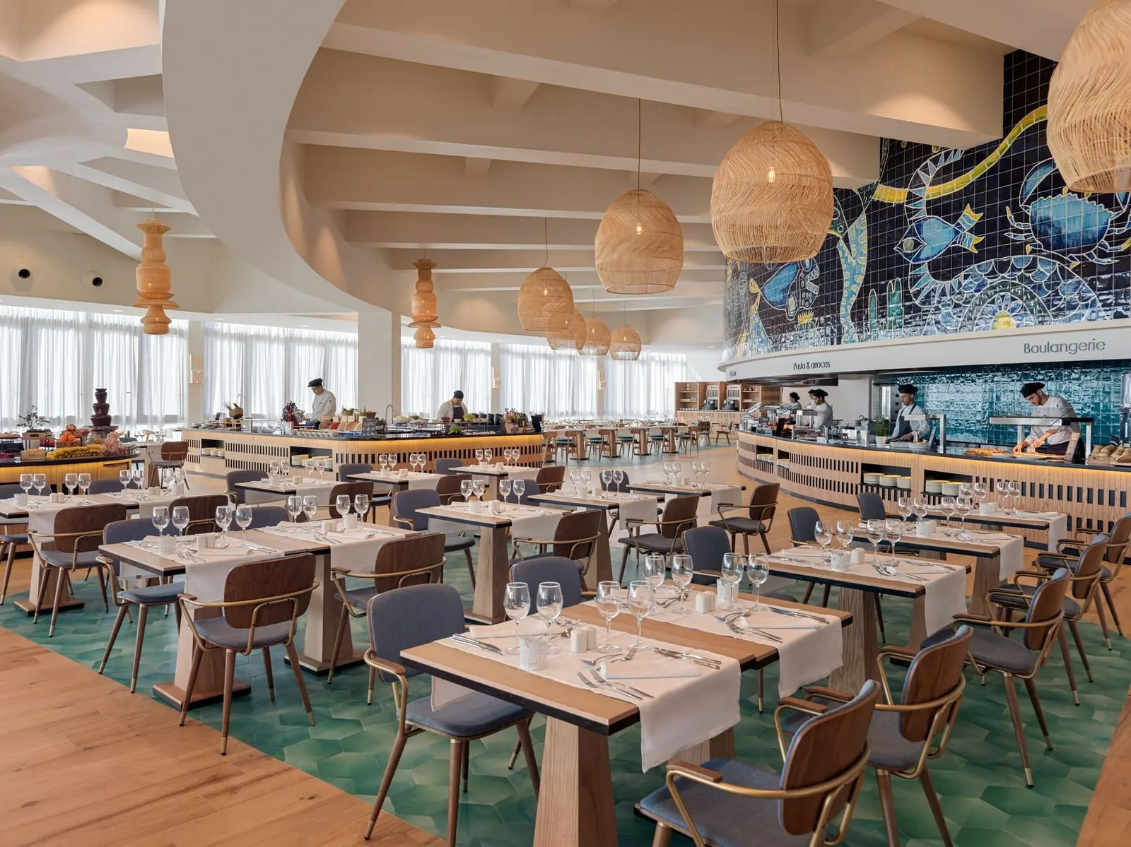 H10 Atlantic Sunset: A spacious restaurant with multiple dining areas, a central bar