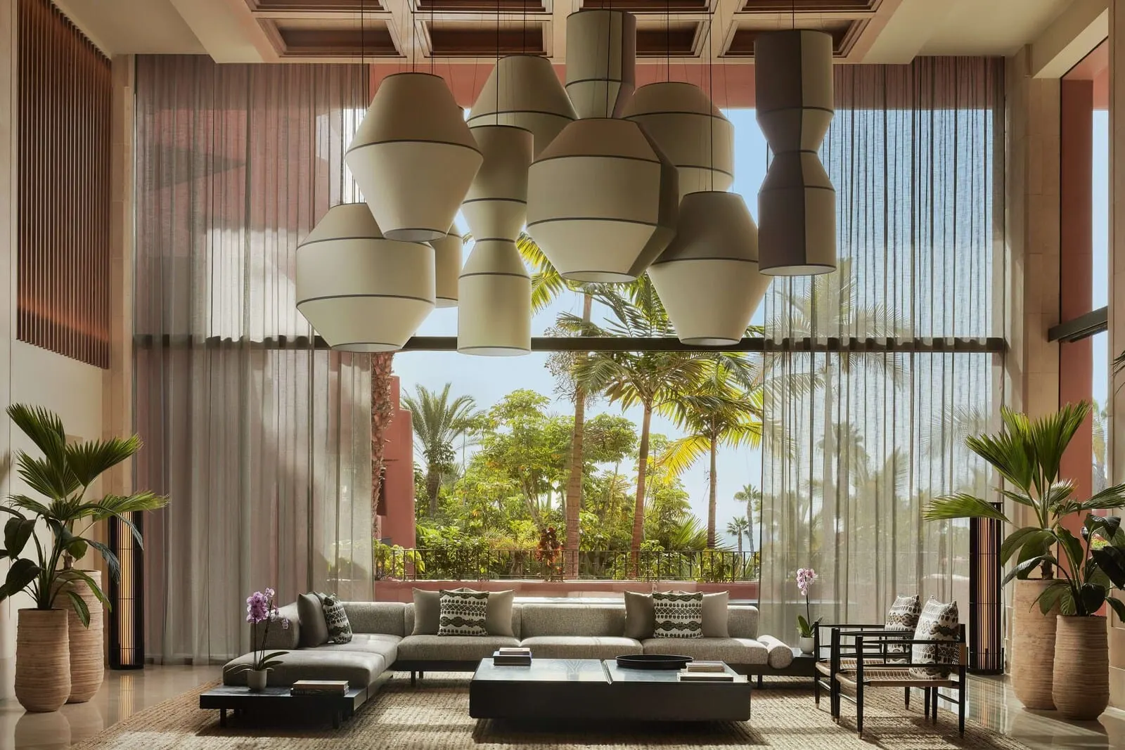Tivoli La Caleta Tenerife Resort: A spacious living area with a large sofa set, a coffee table