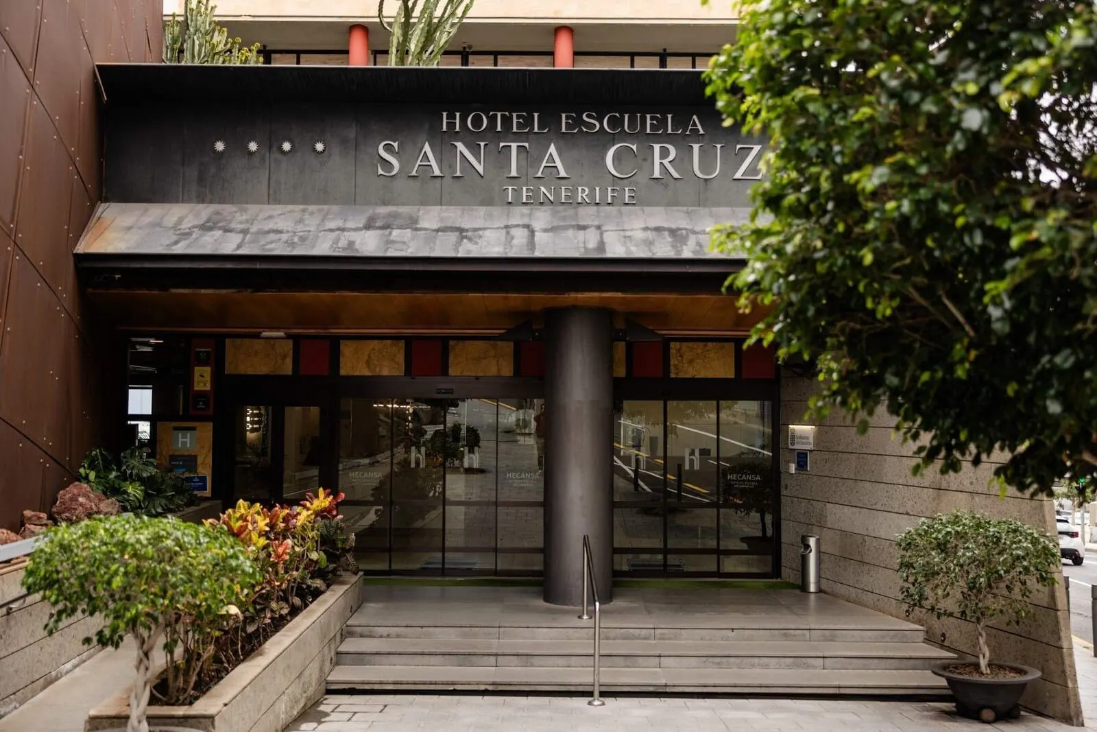 Hotel Escuela Santa Cruz: The entrance to Hotel Escuela Santa Cruz in Tenerife, featuring a modern facade