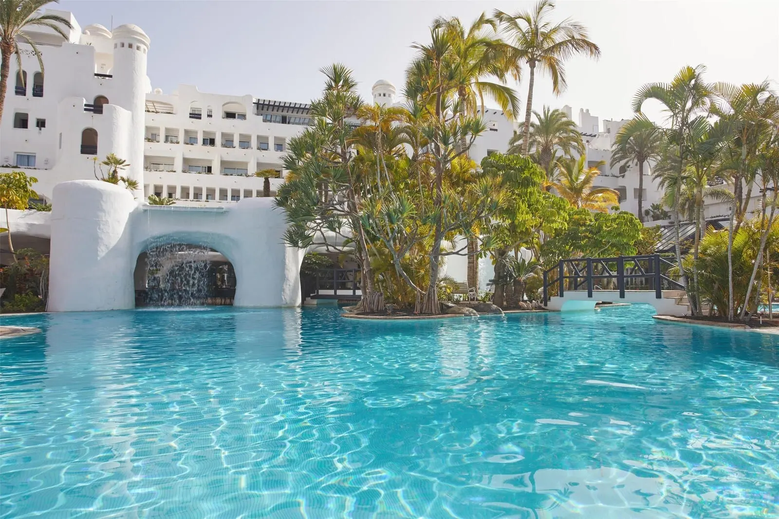 Hyatt Ziva Jardín Tropical Tenerife: A swimming pool with a waterfall feature