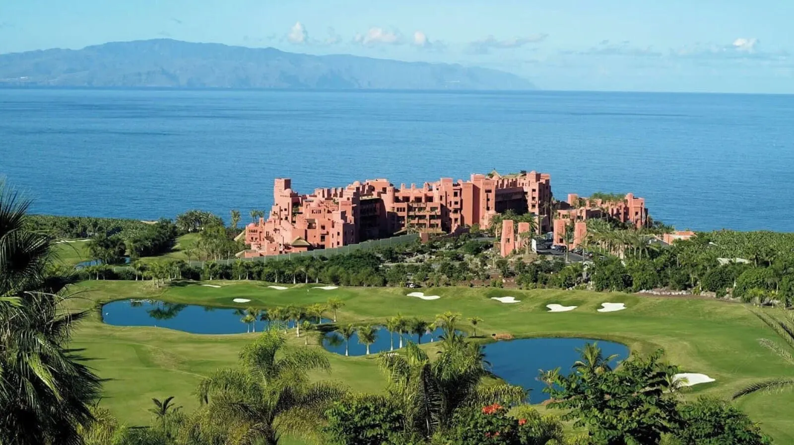 Rok Plaza: A large resort with multiple buildings, a golf course, and two ponds