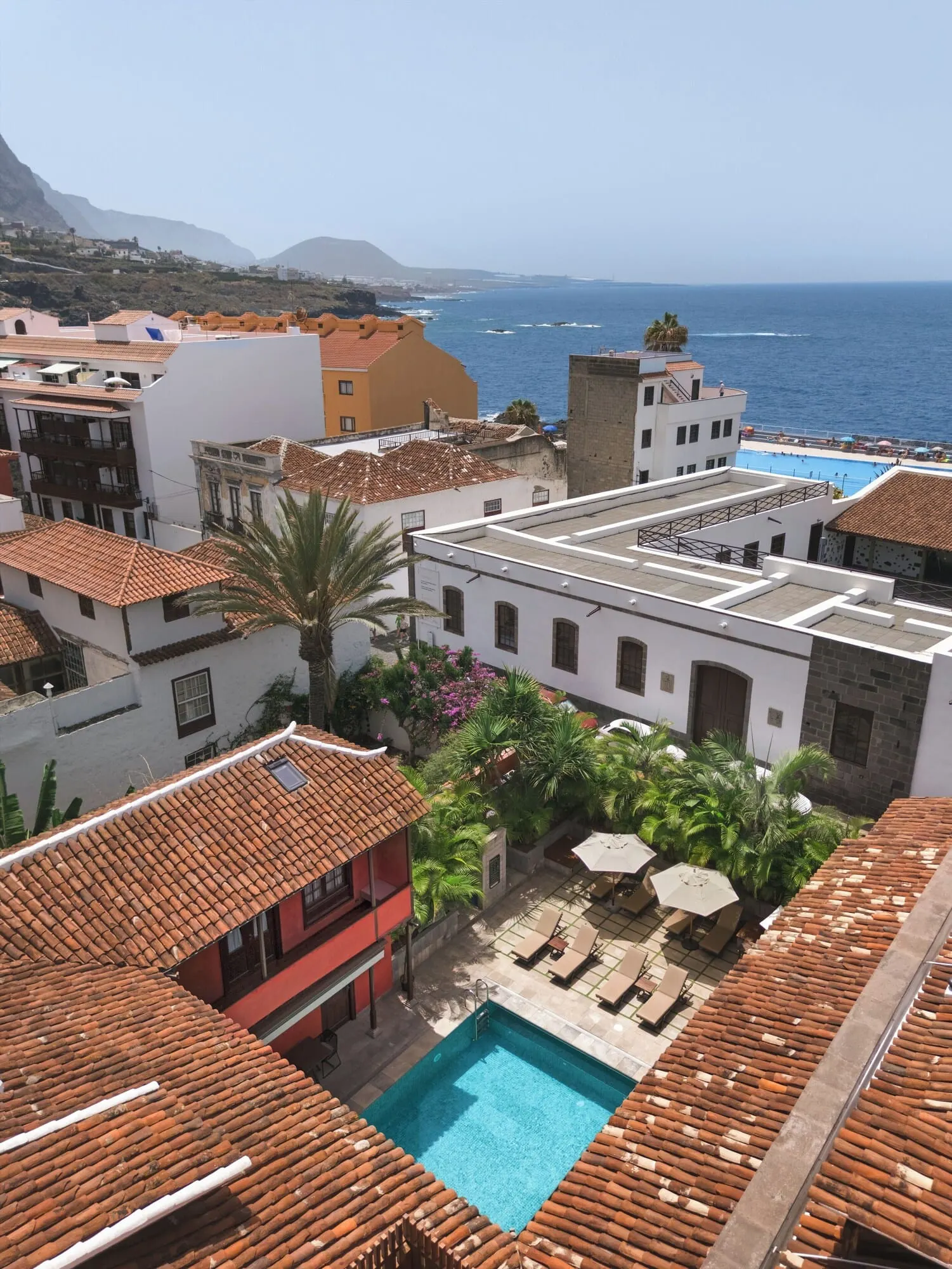 Hotel San Roque: A rooftop pool with terracotta tiles