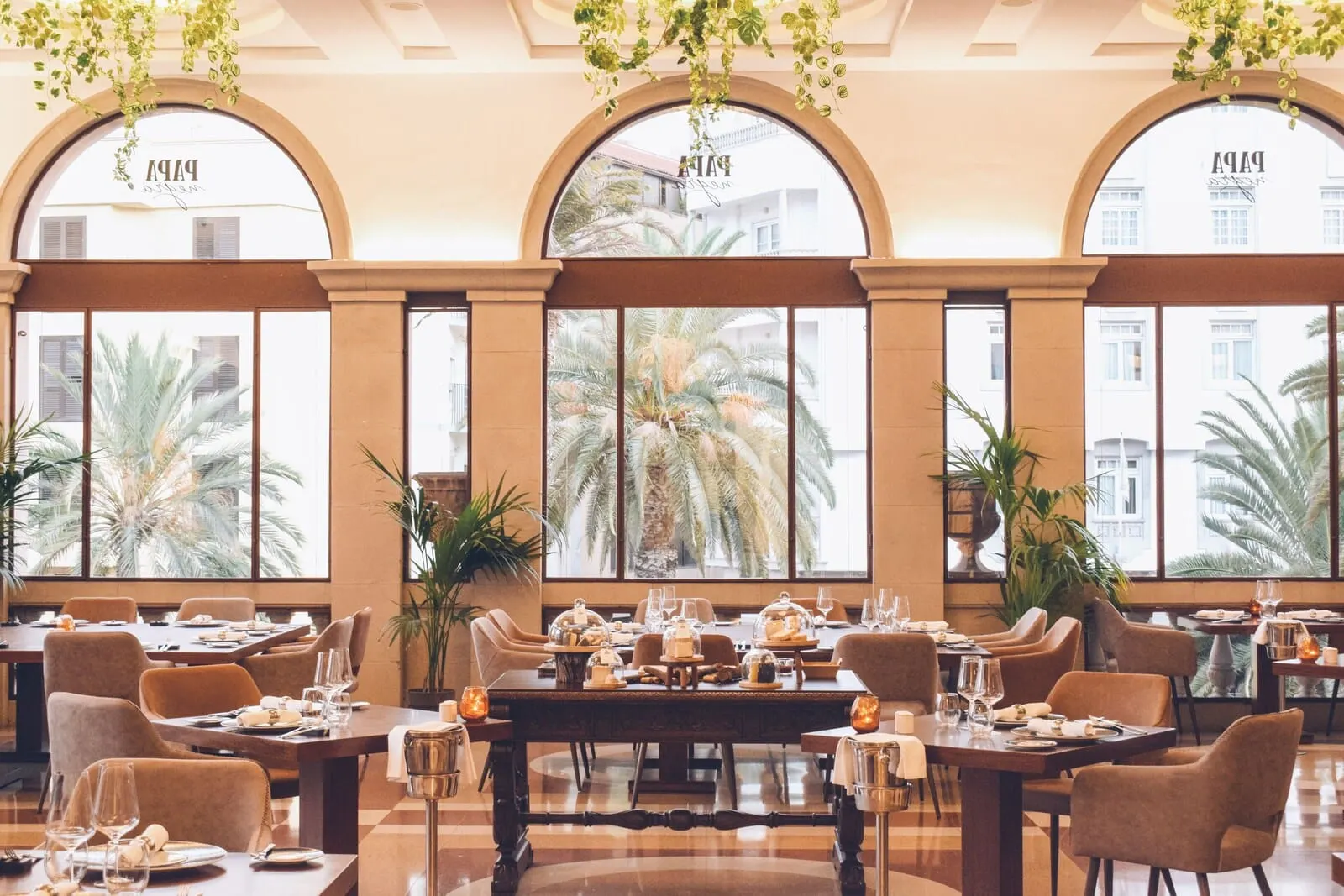 Iberostar Heritage Grand Mencey: A spacious dining area with large windows, elegant table settings