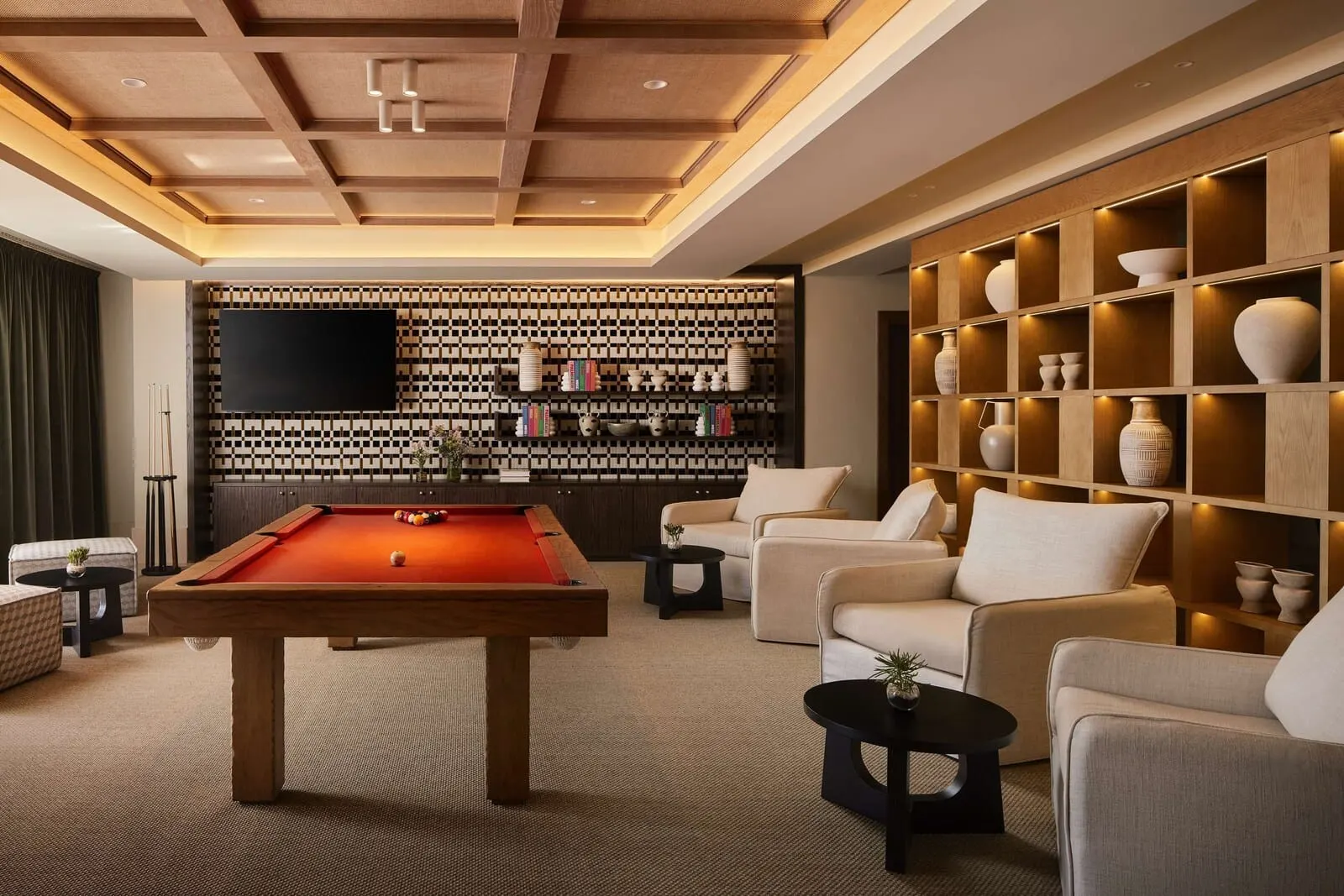Tivoli La Caleta Tenerife Resort: A modern living room with a pool table, comfortable seating, a wall-mounted TV