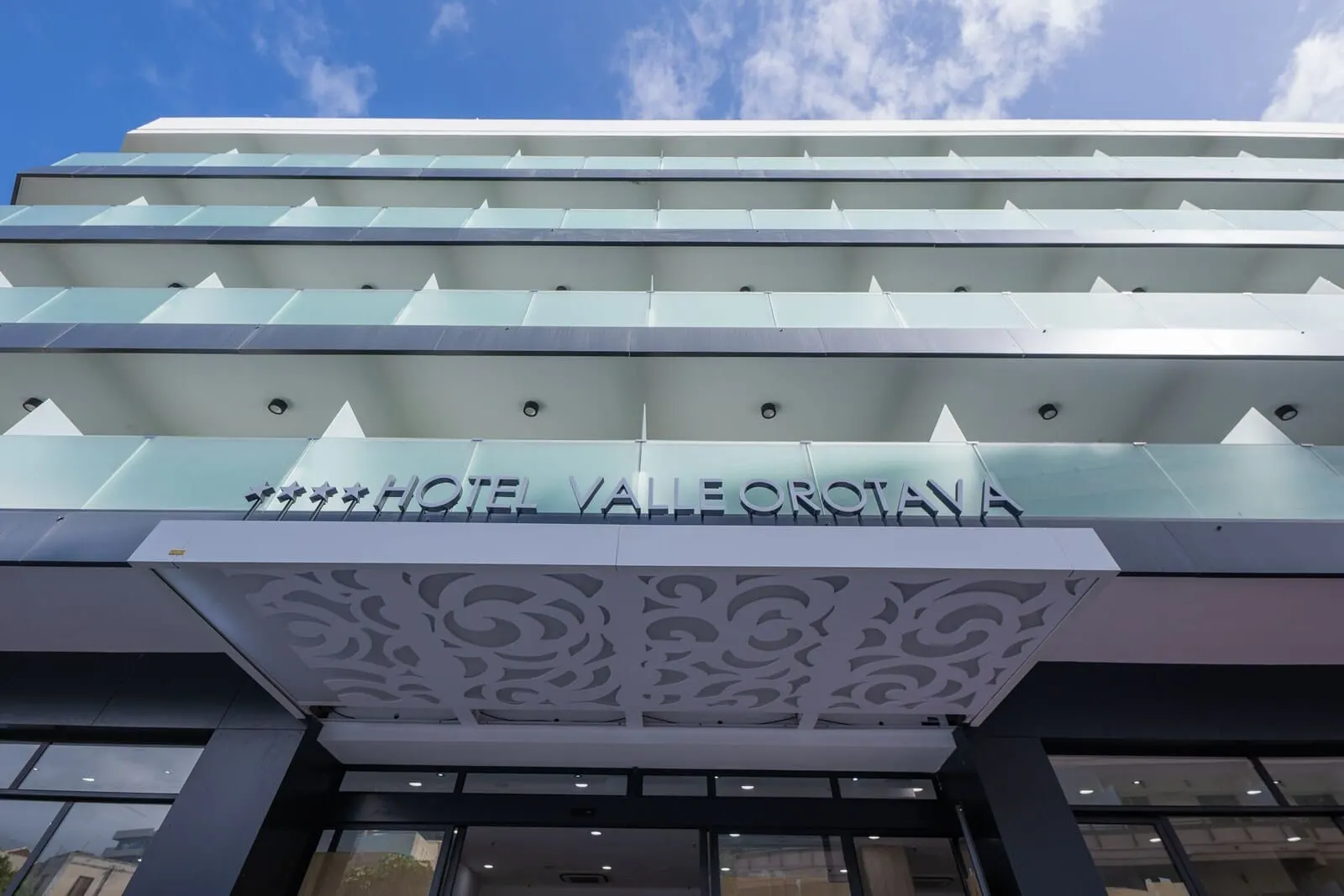 AF Valle Orotava Hotel: A modern hotel with a glass facade and a decorative ceiling