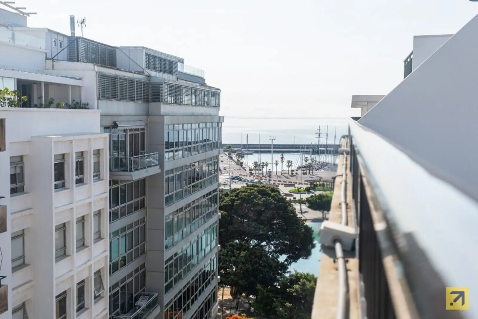 Hotel Adonis Plaza: A modern building with multiple floors, large windows