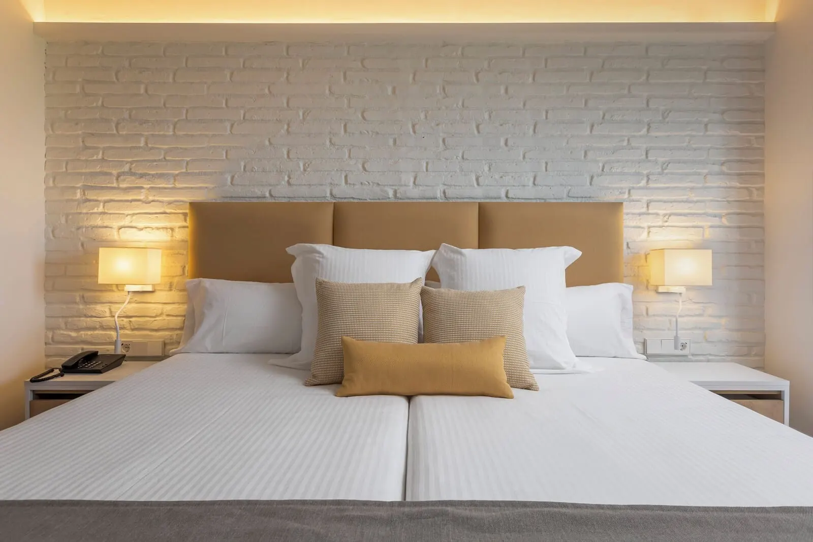 AluaSoul Orotava Valley: A neatly made bed with white linens and a beige headboard