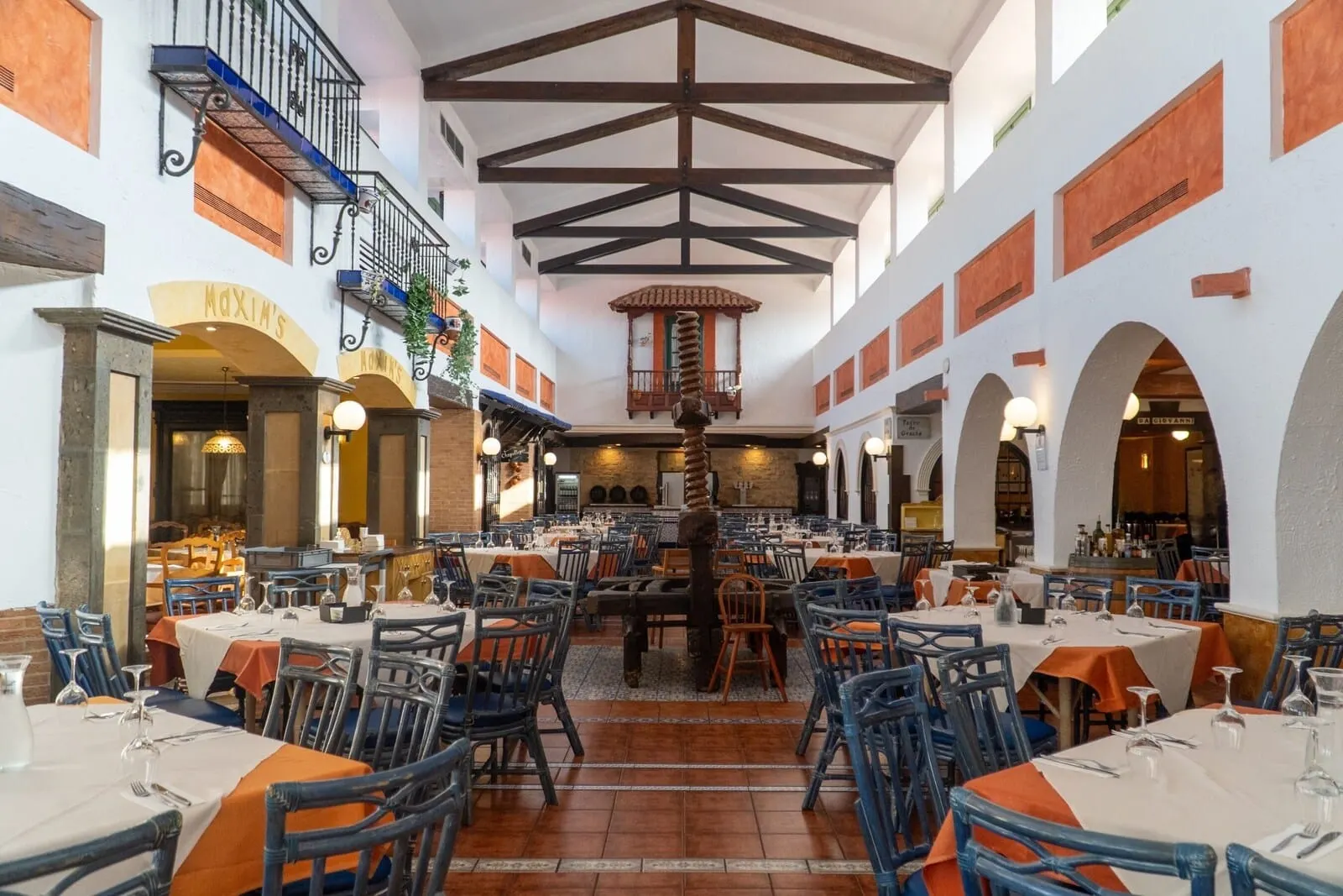 Park Club Europe: A spacious restaurant with high ceilings and exposed beams