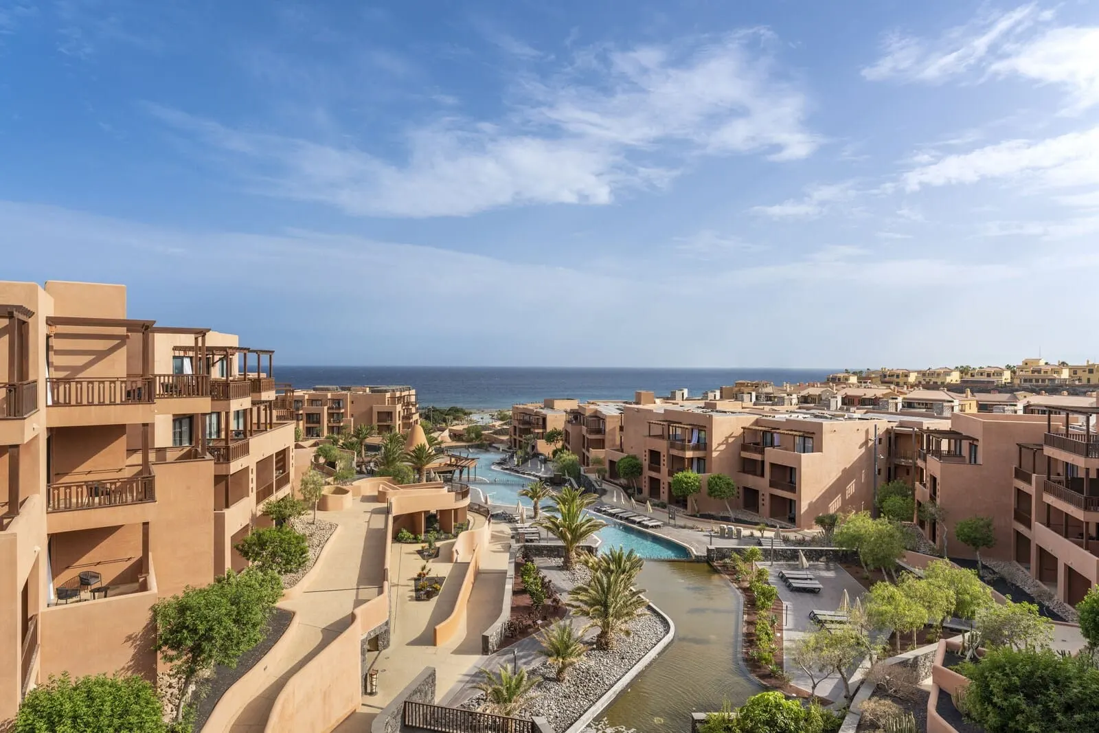 Barceló Tenerife: A resort with multiple buildings, a swimming pool, and a water feature