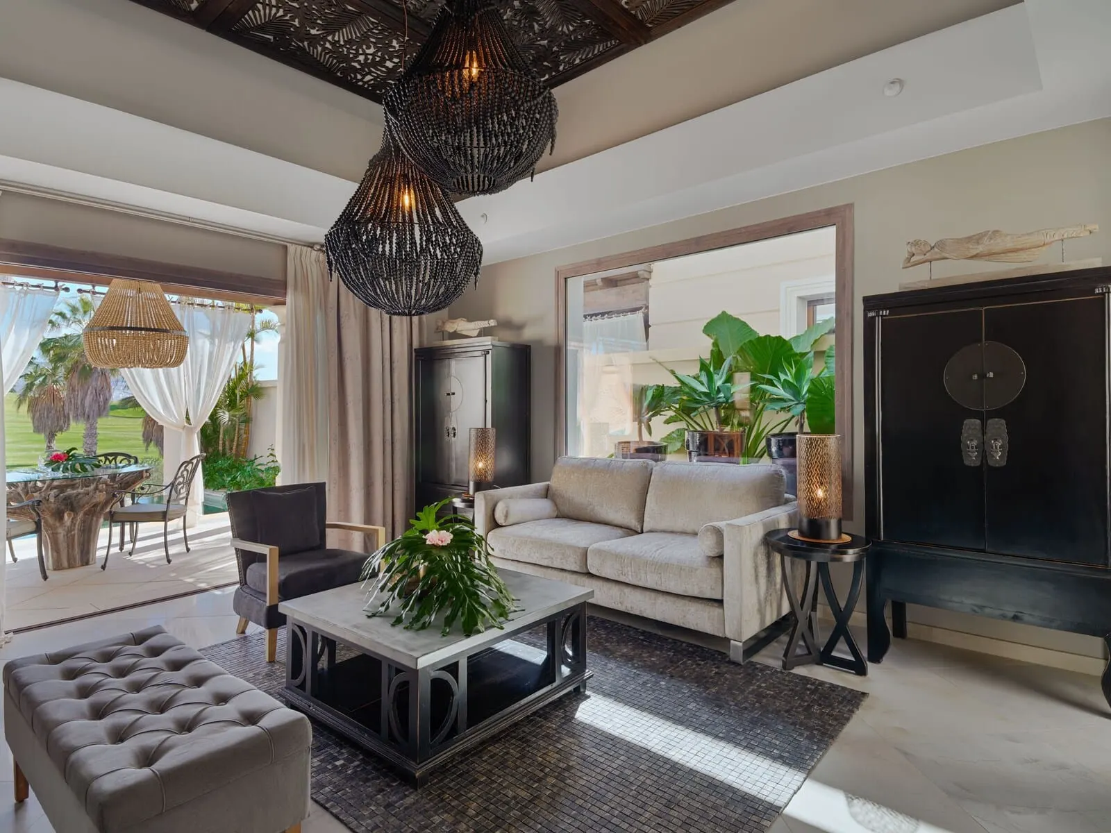 Royal River: A modern living room with a sofa, coffee table, and decorative lighting