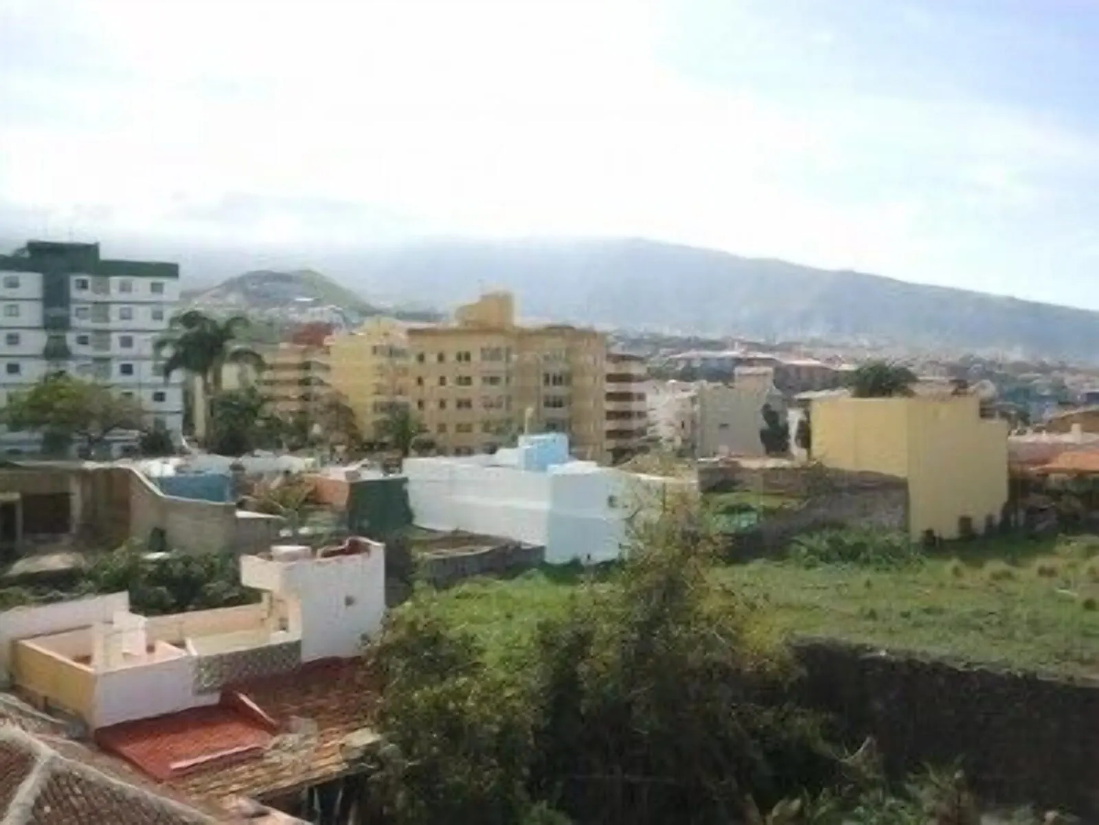 Hotel Tejuma: A residential area with multi-story buildings