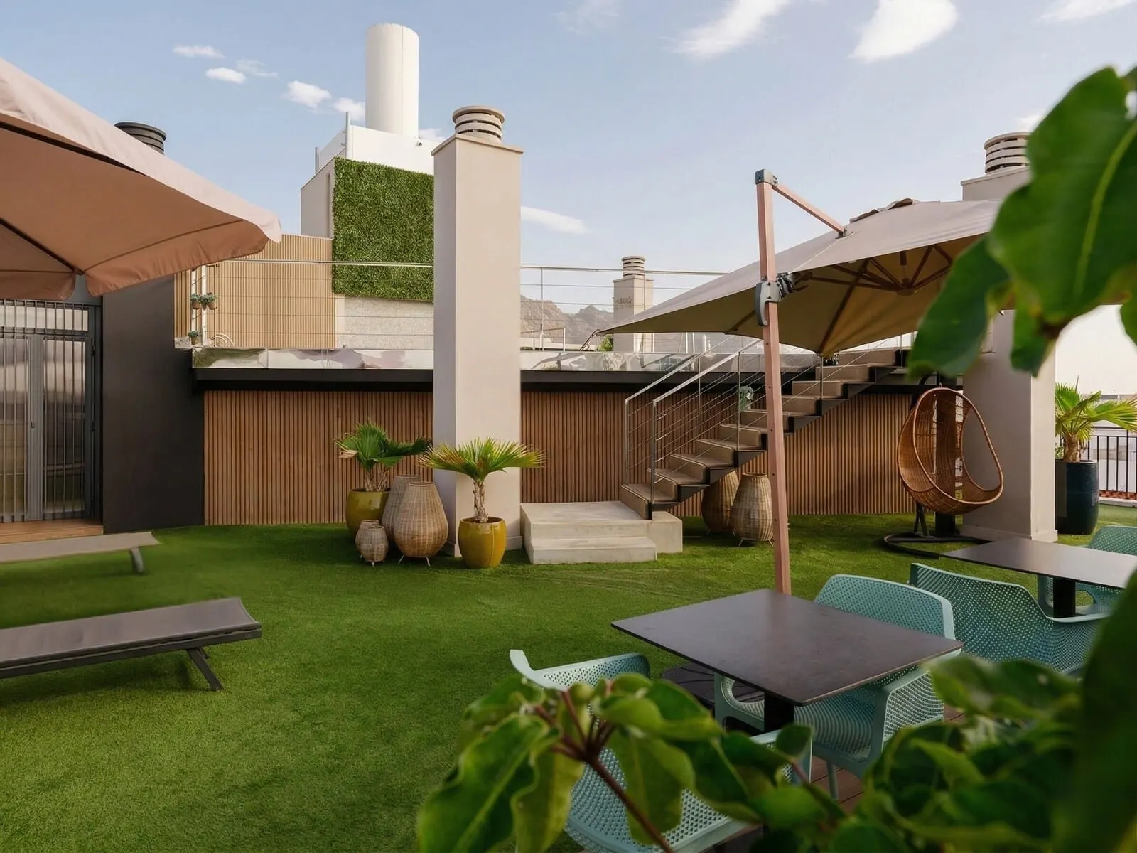 Hotel Taburiente: A rooftop terrace with a modern design, featuring a staircase, outdoor seating