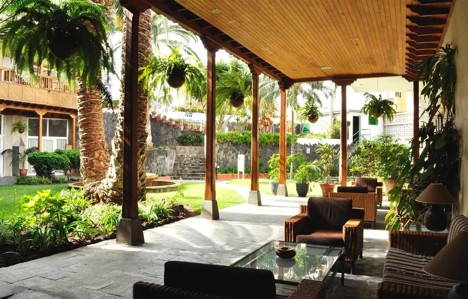 Catalonia Las Vegas: A covered outdoor seating area with a stone floor