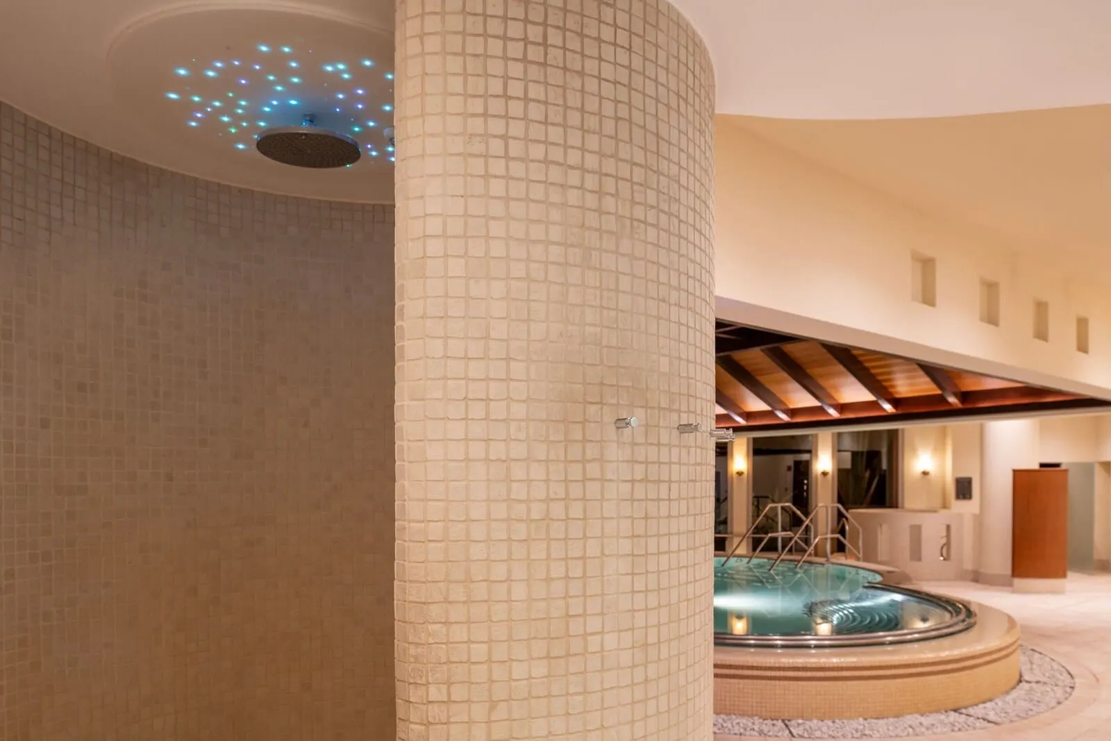The Ritz-Carlton Tenerife, Abama: A spa area with a hot tub, tiled walls, and a ceiling with a light fixture