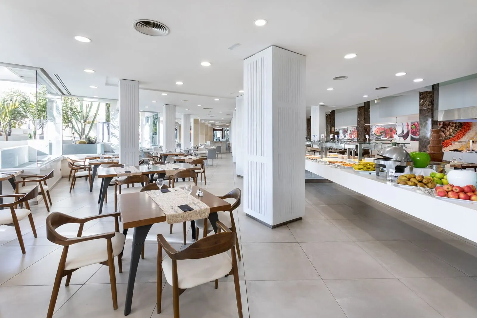 Alexandre Gala: A spacious restaurant with high ceilings, large windows