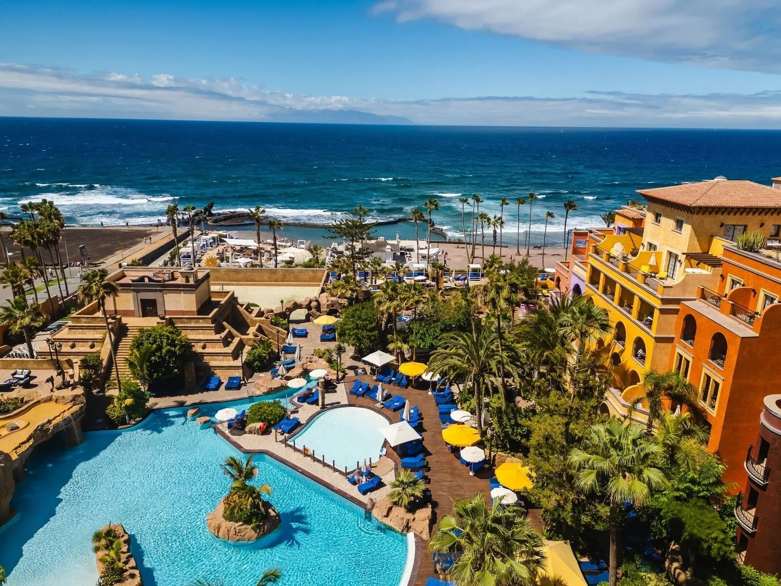 Europe Villa Cortés: A resort with a large pool, beach access, and ocean views