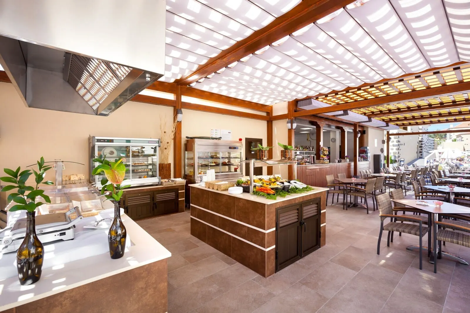 GF Isabel: A spacious restaurant with a central island, multiple seating areas