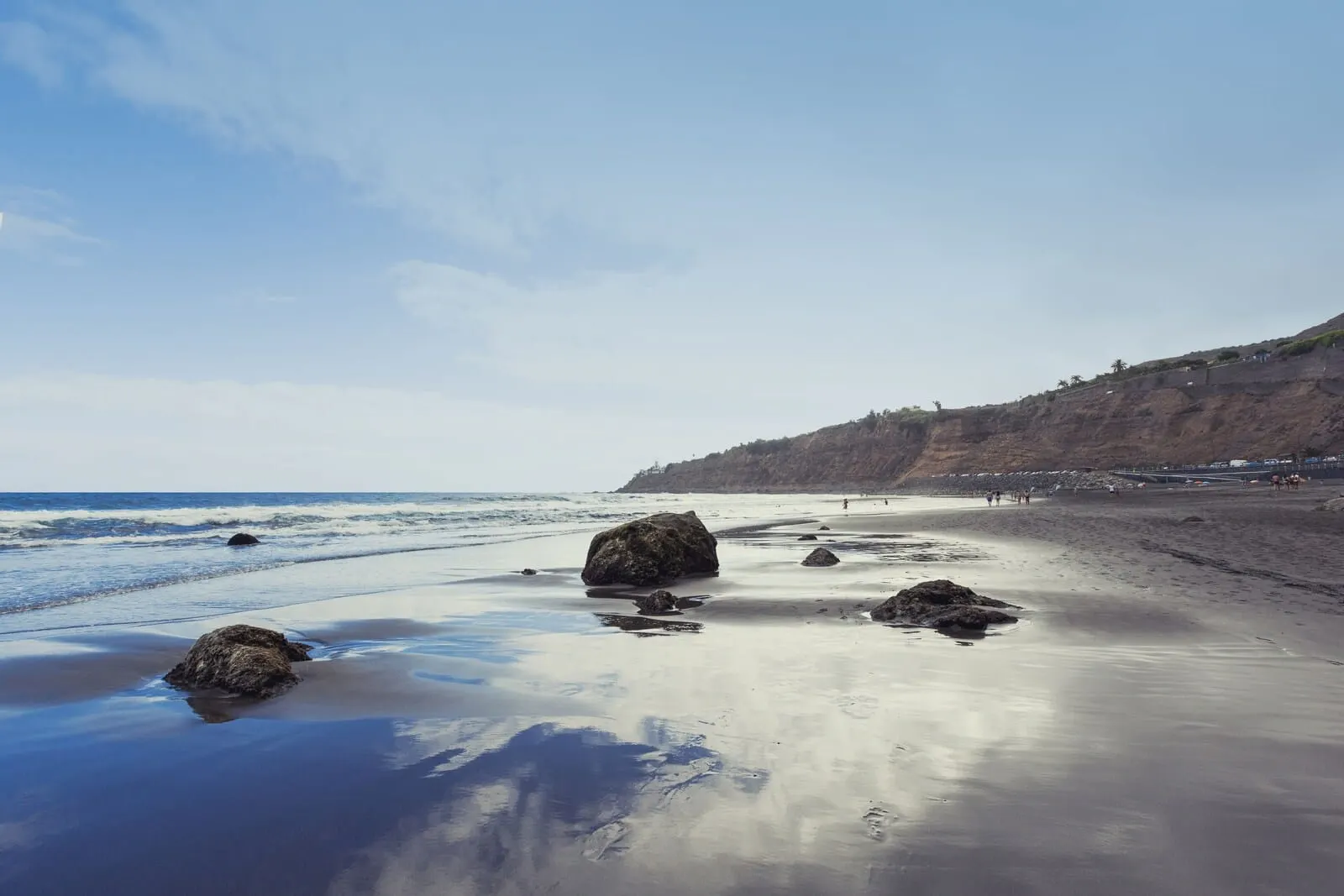 Precise Resort Tenerife: A beach with large rocks and a clear sky