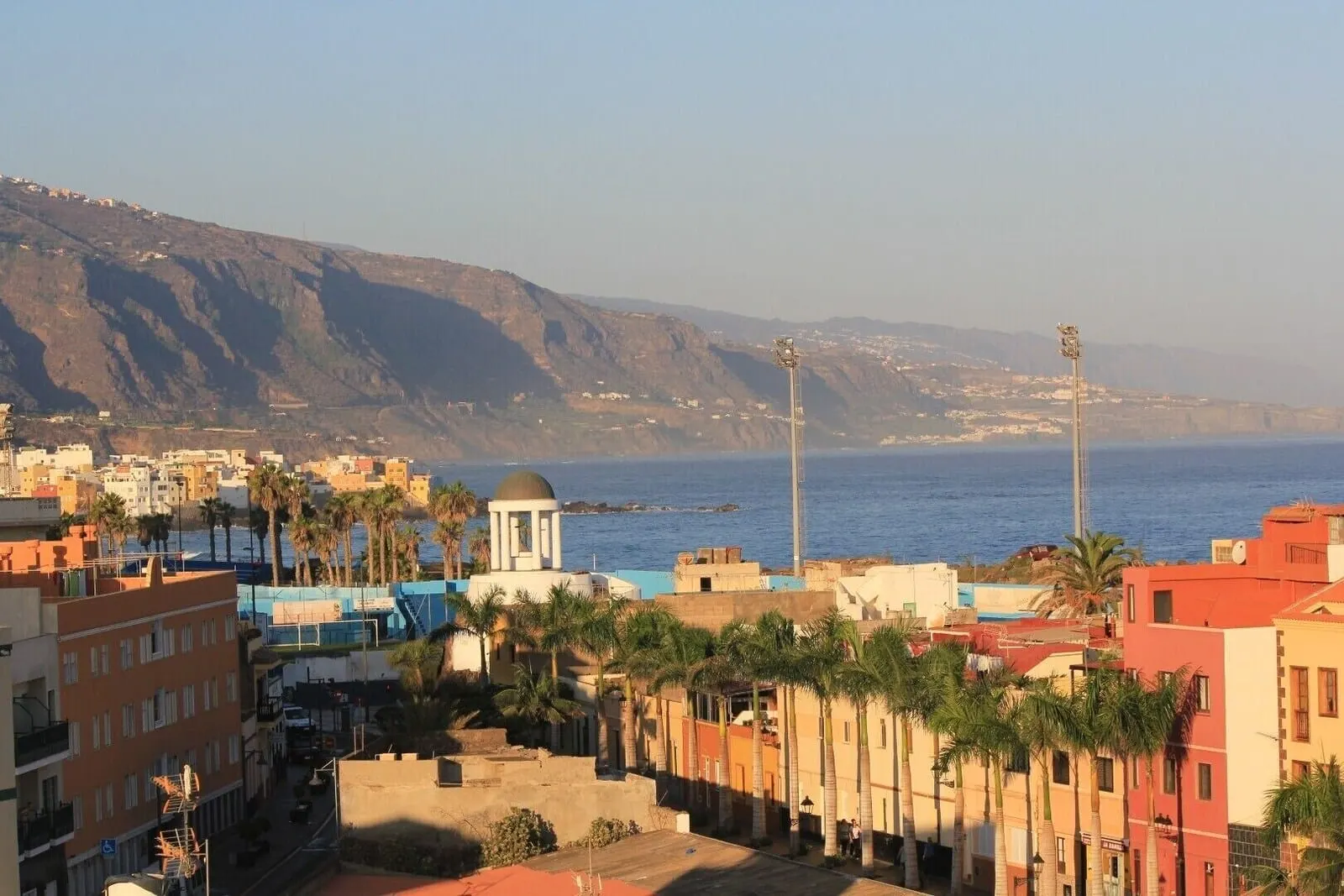 Hotel Sun Holidays: A coastal cityscape with buildings, palm trees